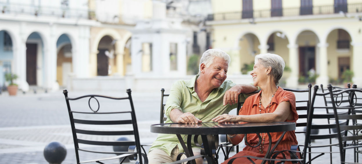 Older couple sitting at a cafe